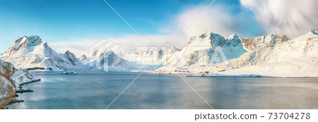 Fabulous winter view on Selfjordenn  during sunny day and Krystad Village 73704278