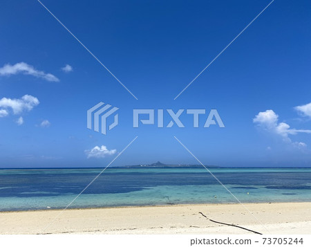 Okinawa's white sand and blue sea 73705244
