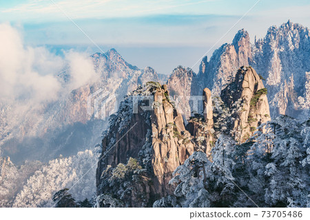 Peaks of Huangshan National park at sunset. 73705486