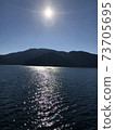 The surface of the shining Lake Ashi 73705695