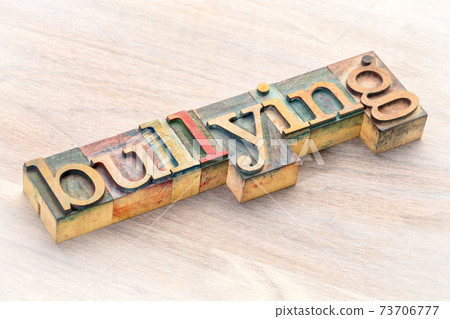 bullying word abstract in wood type bullying word abstract in wood type 73706777