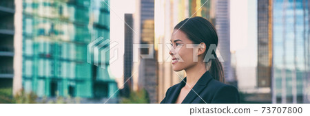 Asian business woman smiling profile portrait successful career young leader in city background panoramic banner Asian business woman smiling profile portrait successful career young leader in city background panoramic banner 73707800