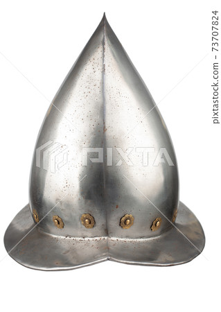 A Spanish conquistador comb morion steeel helmet 16-17th century isolated on white background A Spanish conquistador comb morion steeel helmet 16-17th century isolated on white background 73707824