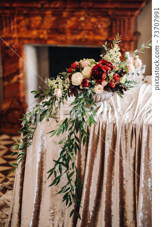 wedding table decoration with flowers on the table in the castle, table decor for dinner by candlelight.Dinner with candles 73707991