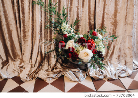 wedding table decoration with flowers on the table in the castle, table decor for dinner by candlelight.Dinner with candles 73708004