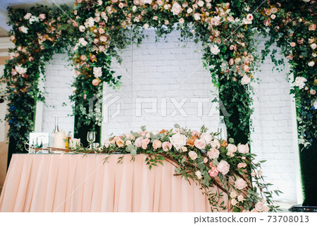wedding table decoration with flowers on the table in the restaurant table decor for candlelit dinner 73708013