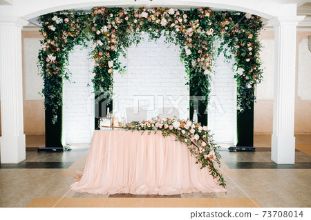 wedding table decoration with flowers on the table in the restaurant table decor for candlelit dinner 73708014