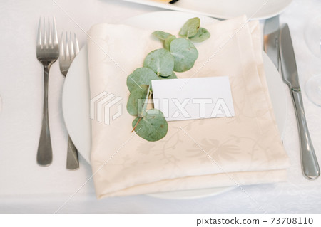 Dishes on the wedding table, decor of the dining table for the holiday 73708110