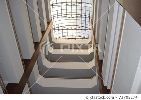 Abstract geometry perspective inside of a building. Geometric pattern architecture. The geometry of the interior of the hotel 73708174