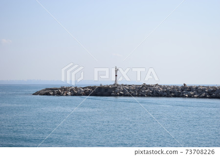 Small lighthouse on the coast. Alanya, Small lighthouse on the coast. Alanya, 73708226