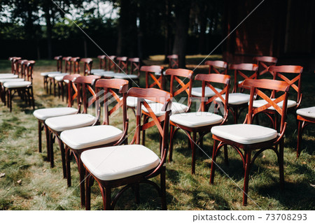 wedding table decoration with flowers on the table in the castle, table decor for dinner by candlelight.Dinner with candles 73708293