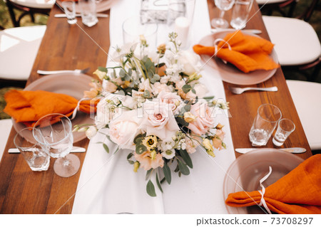 wedding table decoration with flowers on the table, dinner table decor 73708297