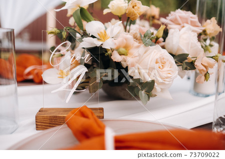 wedding table decoration with flowers on the table, dinner table decor 73709022