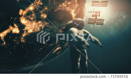 Close-up Earth spaceman of International Space Station ISS silhouette at sun. Solar system planet 73709558