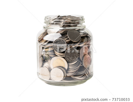 Save money coins in grass jar, Business finance investment concept. 73710033