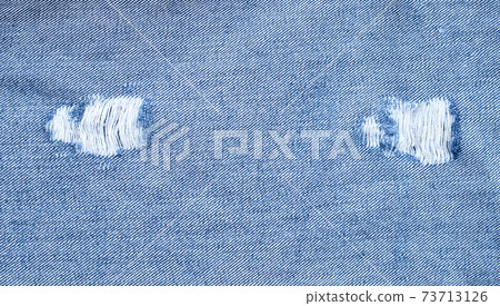 Close up of denim jeans texture background. Close up of denim jeans texture background. 73713126