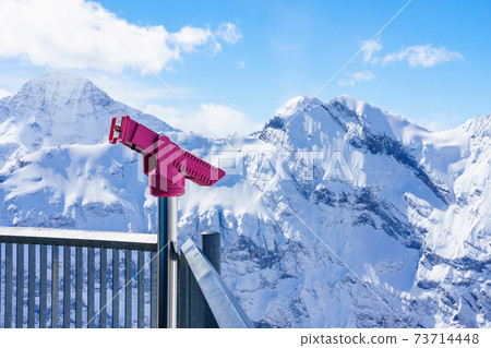 Coin Operated Binocular viewer in Schilthorn Piz Gloria from Murren,Switzerland 73714448