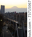 Mt. Fuji and the setting sun in the city 73715067