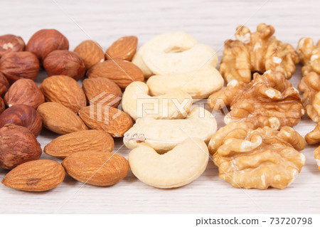 Various nuts and almonds, healthy nutrition and lifestyle 73720798