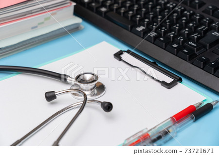 Stethoscope and writing utensils Stethoscope and writing utensils 73721671