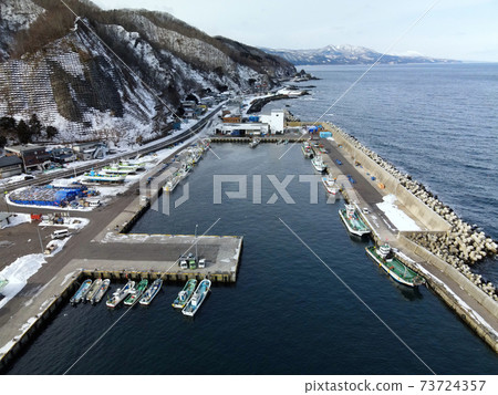 Aerial view of snow scene at Kinaoshi fishing port in Hakodate, Hokkaido in winter Aerial view of snow scene at Kinaoshi fishing port in Hakodate, Hokkaido in winter 73724357