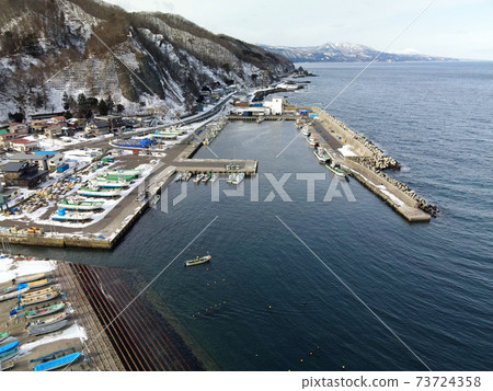 Aerial view of snow scene at Kinaoshi fishing port in Hakodate, Hokkaido in winter Aerial view of snow scene at Kinaoshi fishing port in Hakodate, Hokkaido in winter 73724358