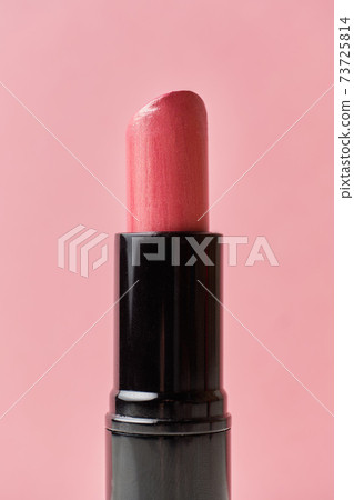 Cosmetic Lip lipstick on a pink background. 73725814