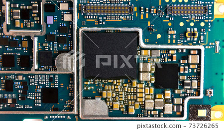 Motherboard for smartphone. Part with microcircuits close-up. 73726265