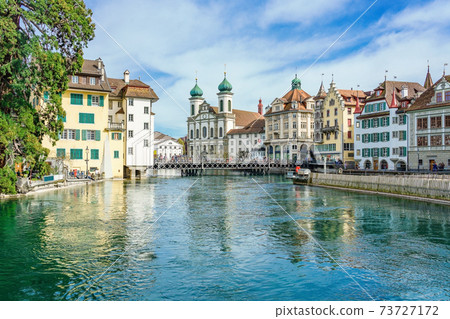 View of the historic city center of Luzern, Jesuitenkirche church and Reuss river, Luzern, Switzerland 73727172