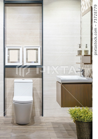 White urinal and washbasin and shower in granite bathroom, Modern house bathroom interior, luxury bathroom 73728779