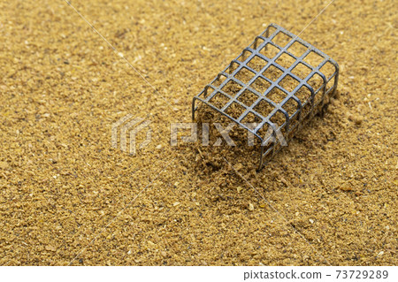 Metal case fish fishing feeder. Metal case fish fishing feeder. 73729289