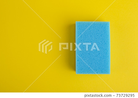 Kitchen washcloth on yellow background. Sponges. Washcloths for cleaning. Kitchen washcloth on yellow background. Sponges. Washcloths for cleaning. 73729295