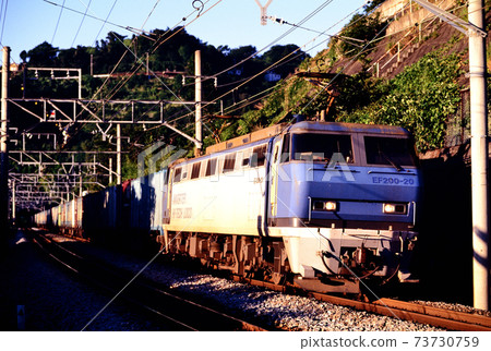 1997 EF200-20 container freight train going on the Tokaido line in the morning 73730759