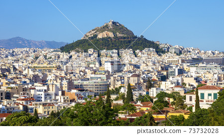 Panorama of Athens and Mount Lycabettus, view from Acropolis slope, Greece 73732028