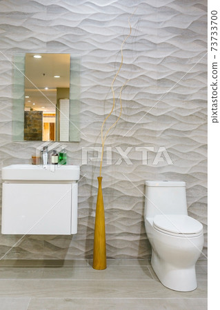 Close up of toilet bathroom interior with white ceramic seat Close up of toilet bathroom interior with white ceramic seat 73733700