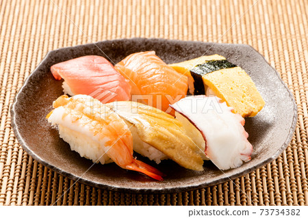 Assorted nigiri sushi. 73734382