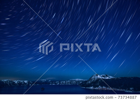 Lake Mashu surrounded by the starry sky 73734887