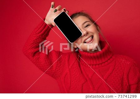 Photo of beautiful smiling young woman good looking wearing casual stylish outfit standing isolated 73741299