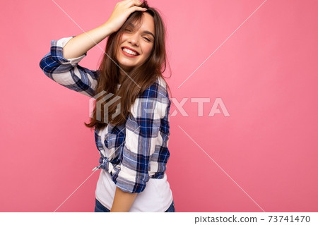 Portrait of positive cheerful fashionable woman in hipster outfit isolated on pink background with Portrait of positive cheerful fashionable woman in hipster outfit isolated on pink background with 73741470
