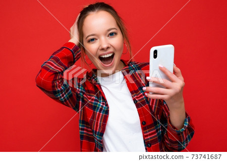 Closeup portrait Photo of attractive crazy amazed surprised young woman wearing casual stylish Closeup portrait Photo of attractive crazy amazed surprised young woman wearing casual stylish 73741687