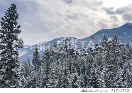 Fairmont Banff Springs in winter sunny day. Banff National Park, Canadian Rockies. 73741790