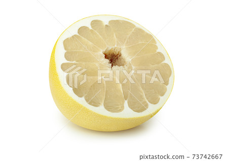 Pamela citrus fruit one cut in half isolated on white background Pamela citrus fruit one cut in half isolated on white background 73742667