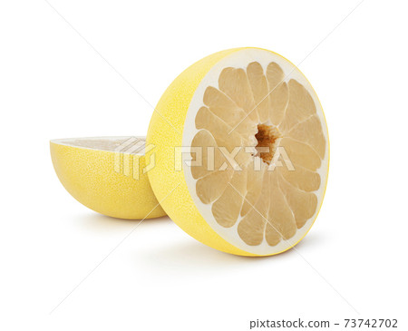 Pamela citrus fruit one cut in half isolated on white background Pamela citrus fruit one cut in half isolated on white background 73742702