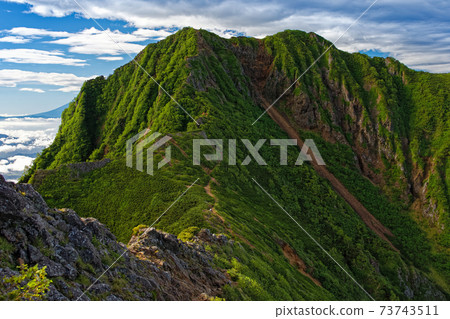Yatsugatake mountain range and Gongendake seen from the vertical route to Akadake Yatsugatake mountain range and Gongendake seen from the vertical route to Akadake 73743511