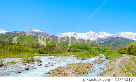 Scenery of Hakuba Village (Spring): Overlooking the Northern Alps with residual snow Scenery of Hakuba Village (Spring): Overlooking the Northern Alps with residual snow 73744219