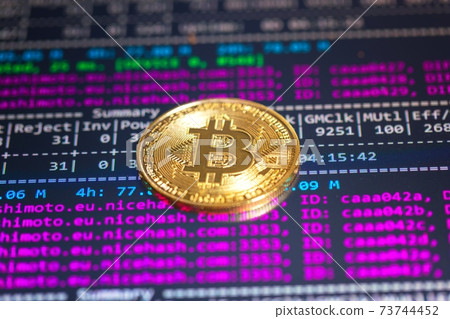 Bitcoin with mining program in the background Bitcoin with mining program in the background 73744452