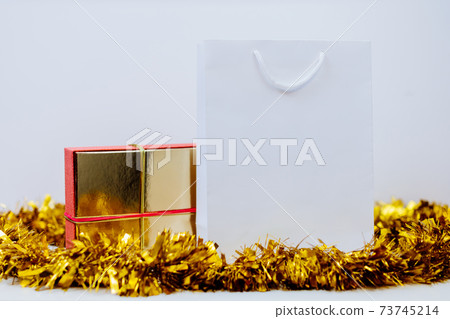 white shopping bag and gift package mockup white shopping bag and gift package mockup 73745214