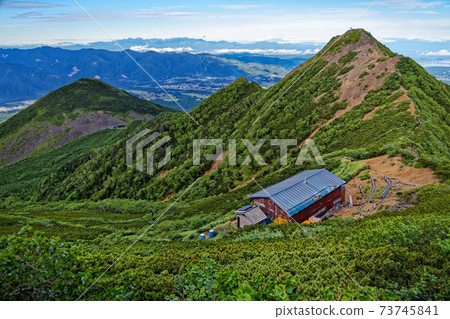 View of Yatsugatake mountain range, Gongen hut and Mt. Amigasa, Central Alps 73745841