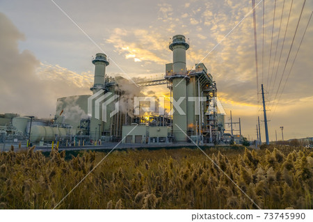 Utah Valley Power Plant against sky at sunset 73745990