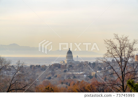 Utah State Capital Building towering over city Utah State Capital Building towering over city 73745993